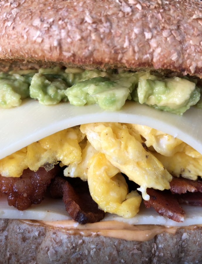 Bacon & Egg Bagel Sandwich with Avo & Chipotle Aioli